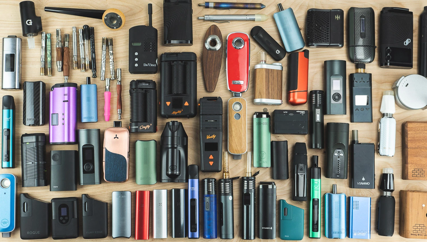 Collection of top 10 portable vaporizers for 2024 arranged on modern surface showing latest models and features